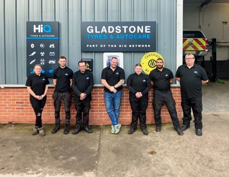 The Gladstone Garage team outside the branded storefront